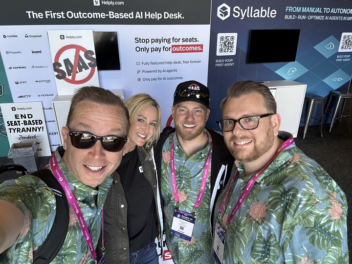 Alex Turnbull with the Helply team at the Helply.com conference booth